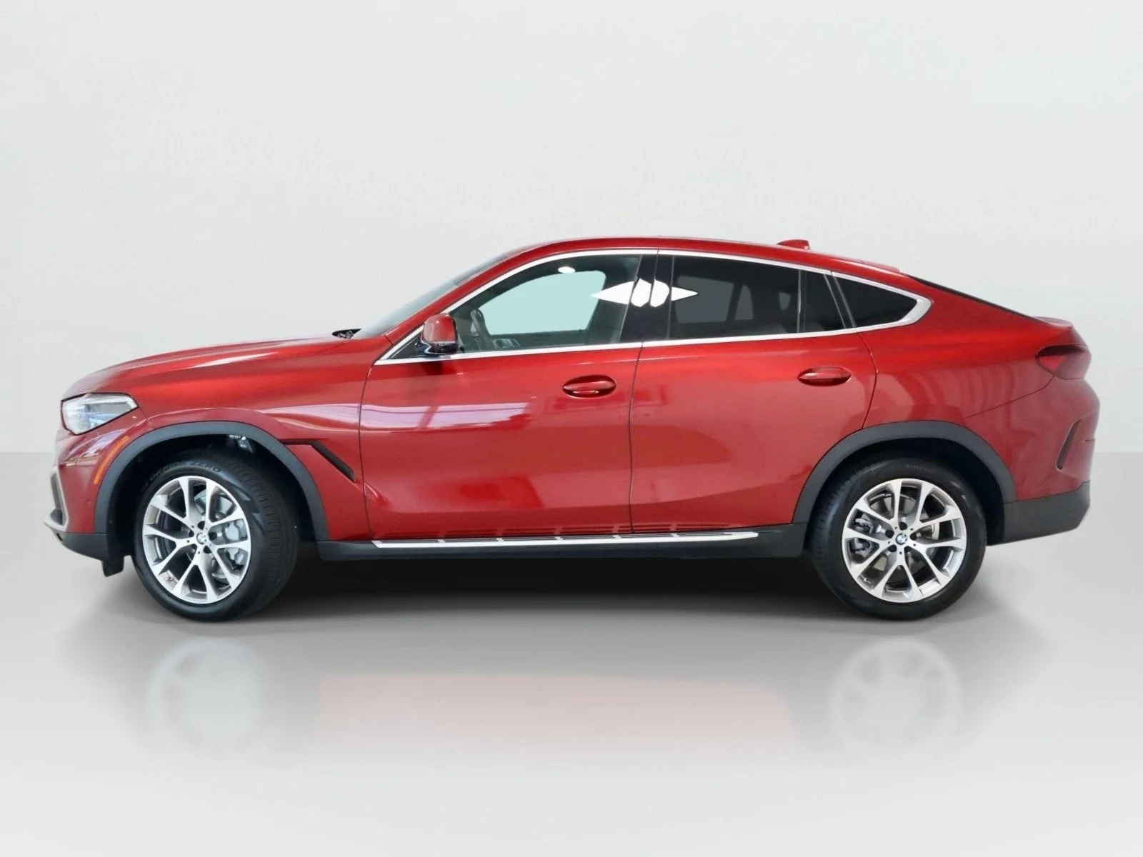 Used 2022 Flamenco Red Metallic BMW xDrive40i image 2