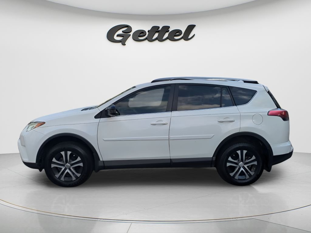 Used 2017 Toyota RAV4 LE with VIN JTMZFREV0HJ137525 for sale in Gainesville, FL