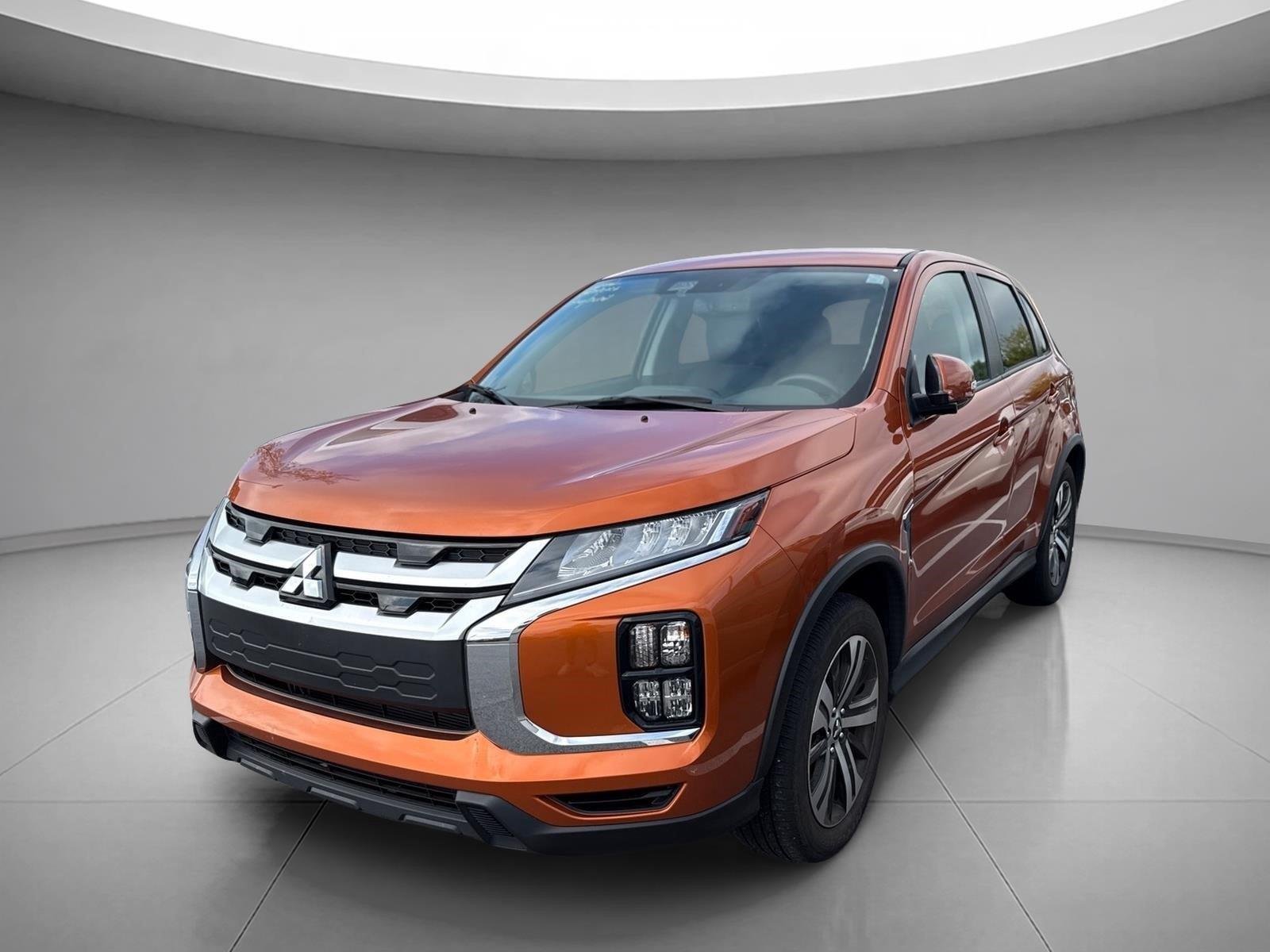 Used 2023 Sunshine Orange Metallic Mitsubishi ES image 1