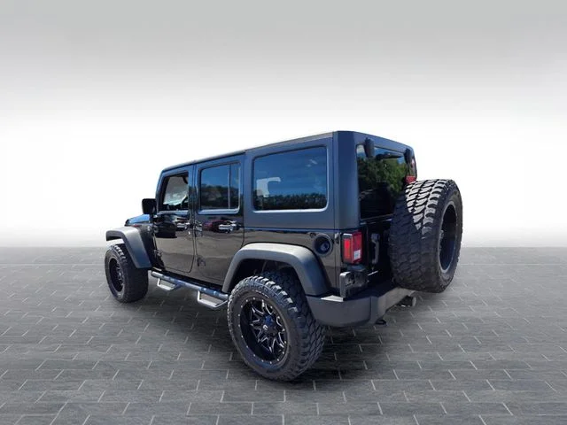 Used 2015 Black Jeep Unlimited Sport image 6