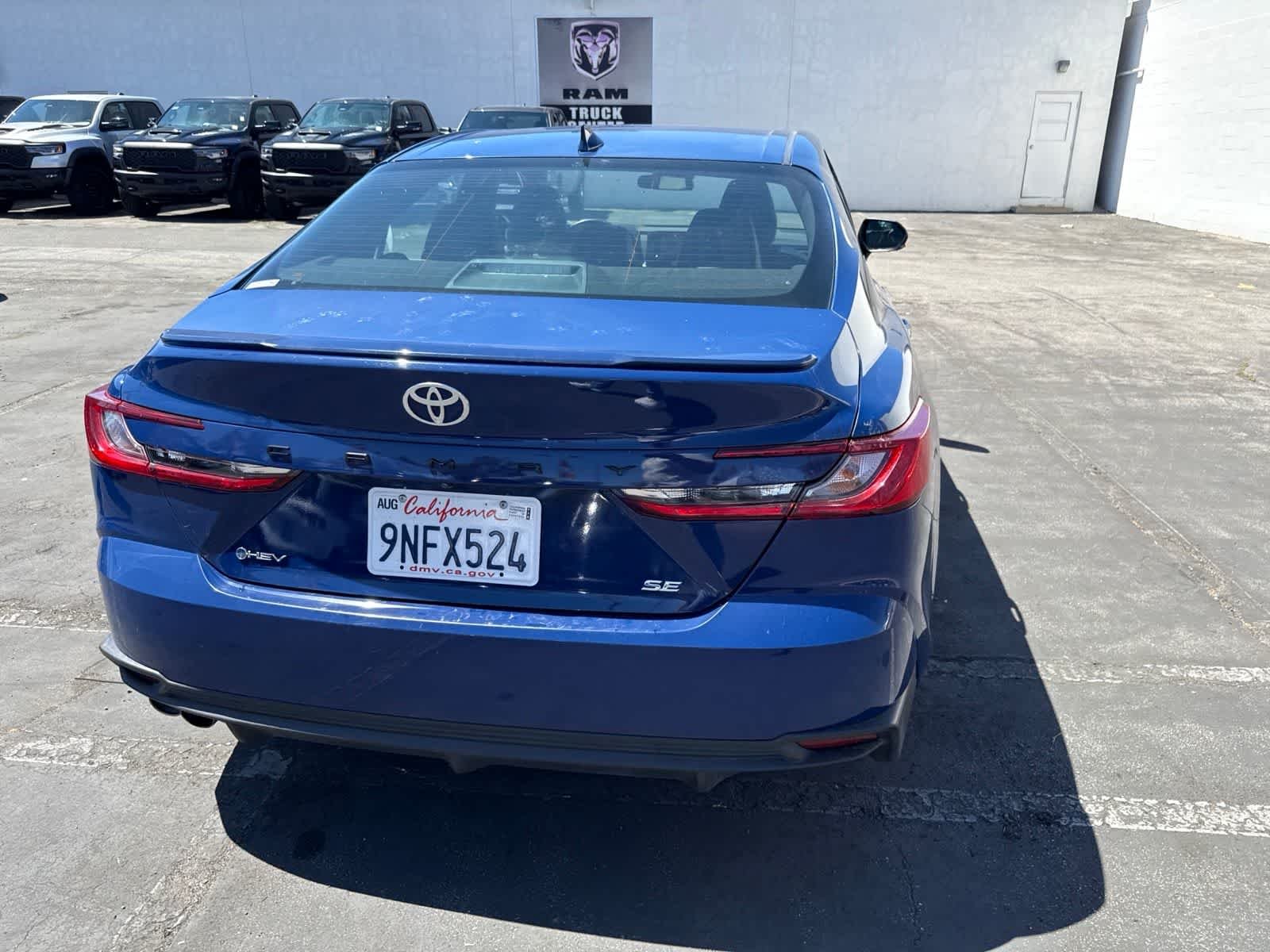 Used 2025 Reservoir Blue Toyota SE image 16