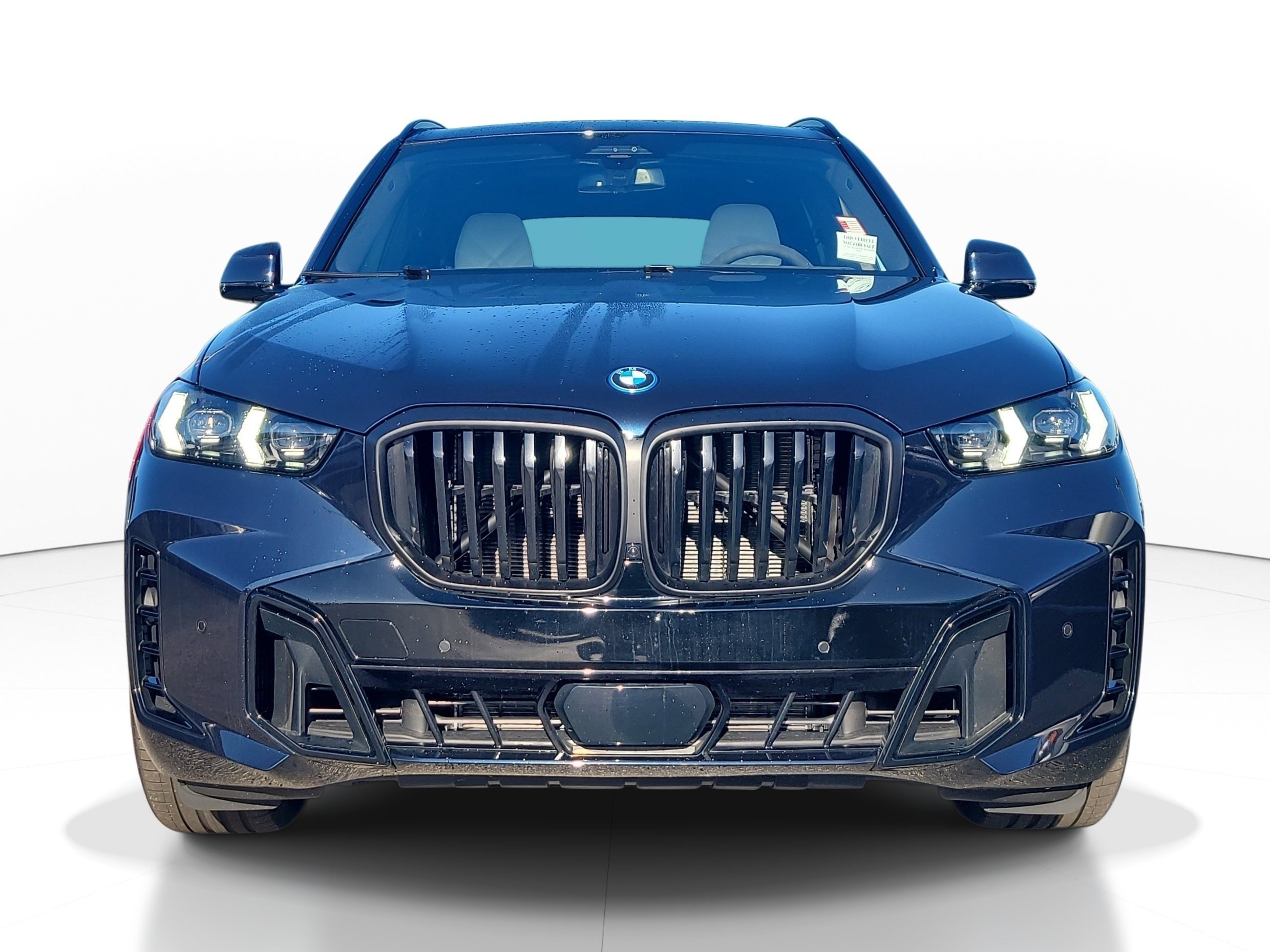 Used 2025 Carbon Black Metallic BMW xDrive50e image 2