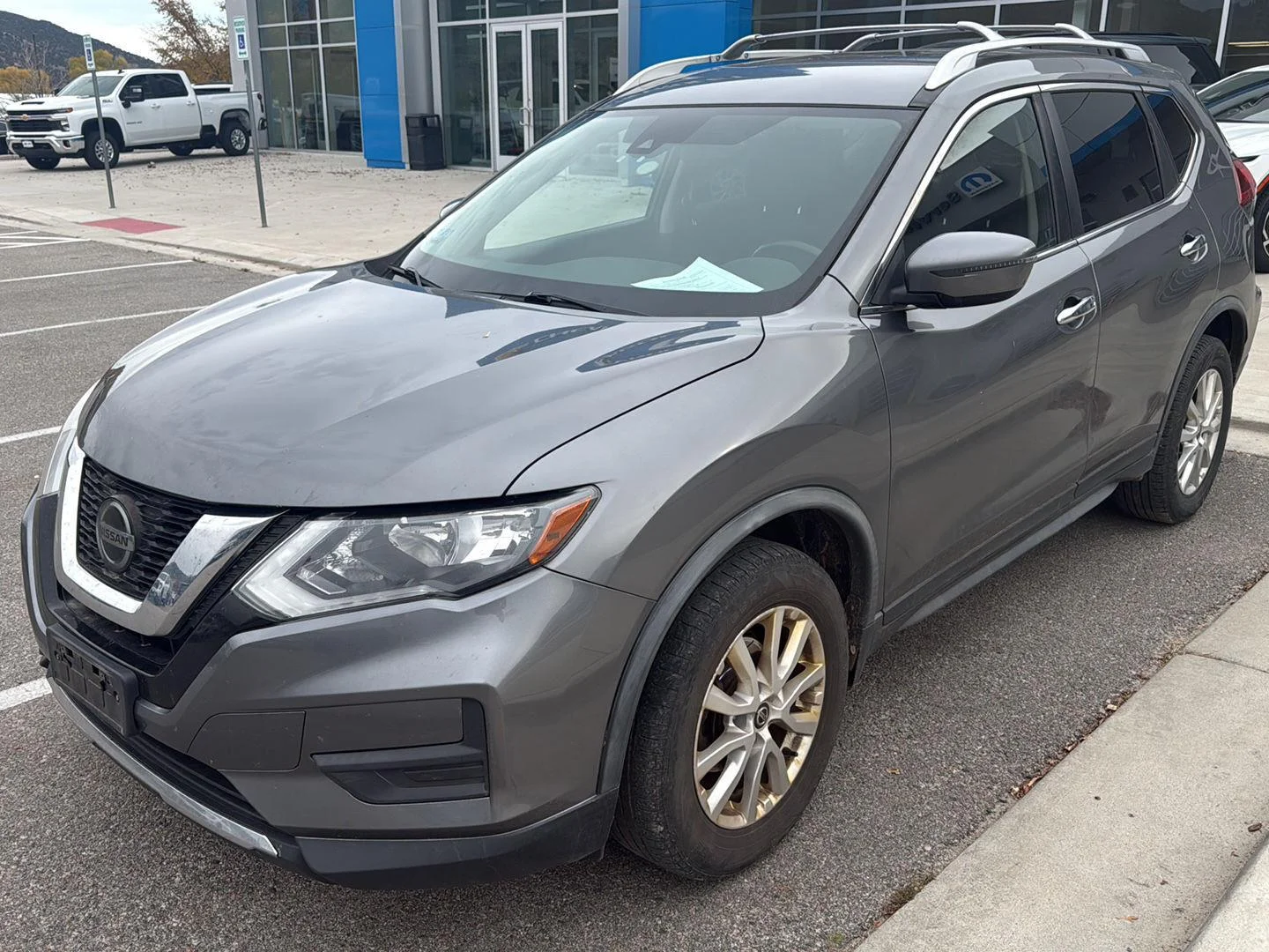 Used 2020 Gun Metallic Nissan SV image 1
