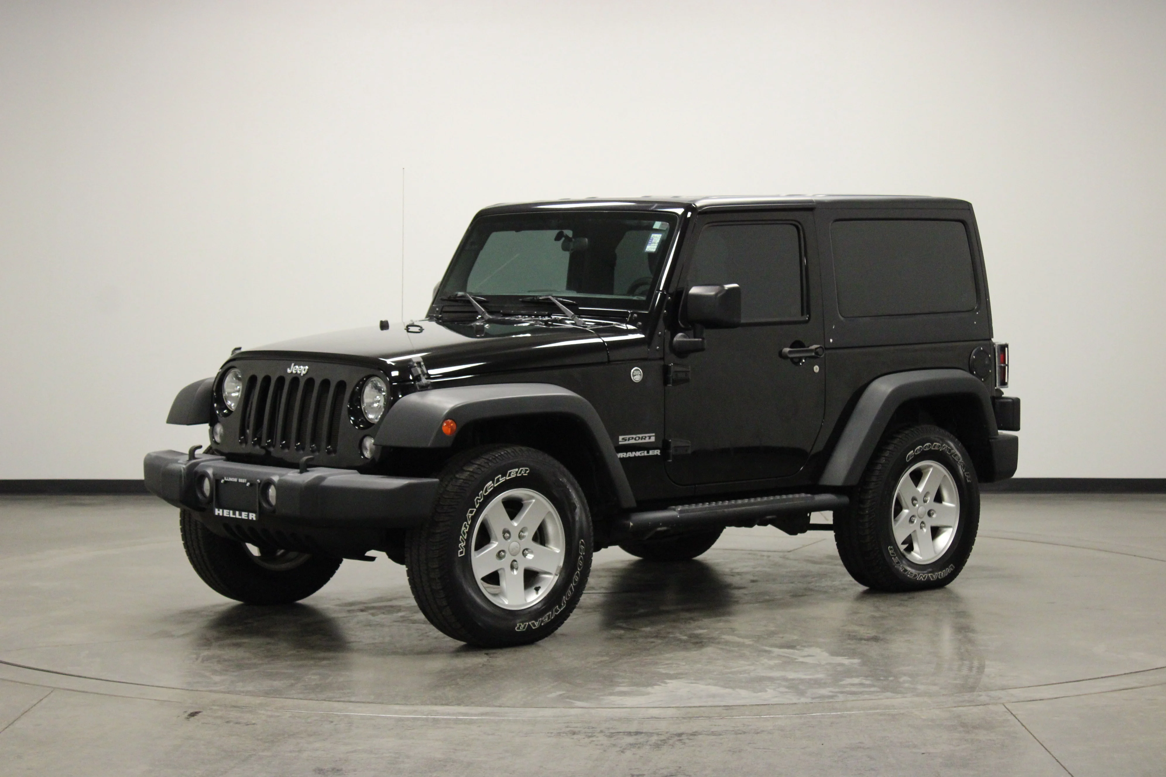 Used 2015 Black Clearcoat Jeep Sport image 4
