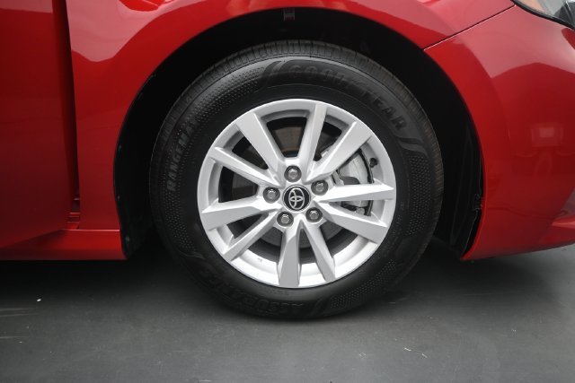 Used 2025 Supersonic Red Toyota LE image 25