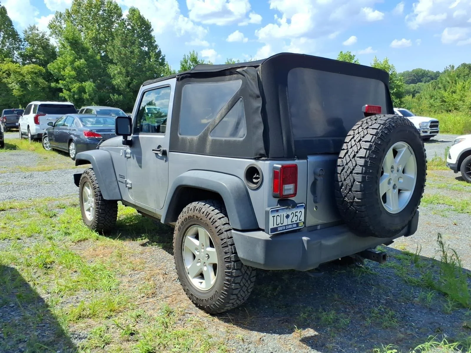 Used 2015 Billet Silver Metallic Clearcoat Jeep Sport image 4