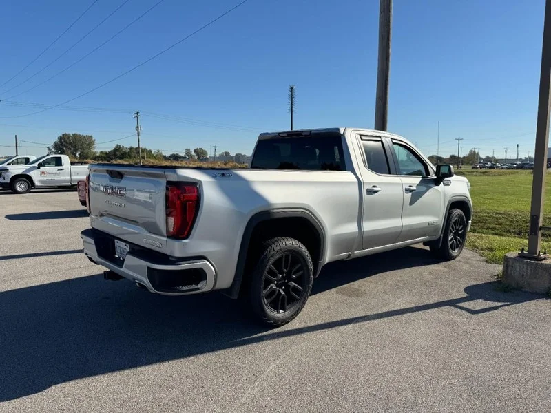 Used 2019 Quicksilver Metallic GMC 4WD Double Cab 147" Elevation image 3