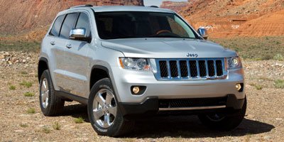 Used 2011 Black Jeep Overland image 1