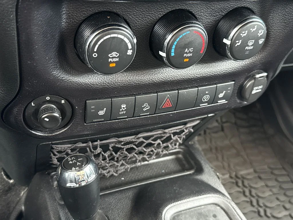 Used 2016 Black Jeep Unlimited Sahara image 18
