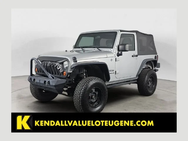 Used 2012 Silver Jeep Sport image 1