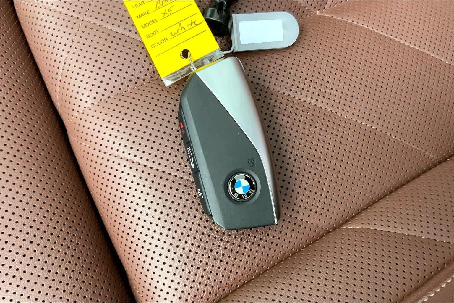 Used 2024 Mineral White Metallic BMW xDrive50e image 14