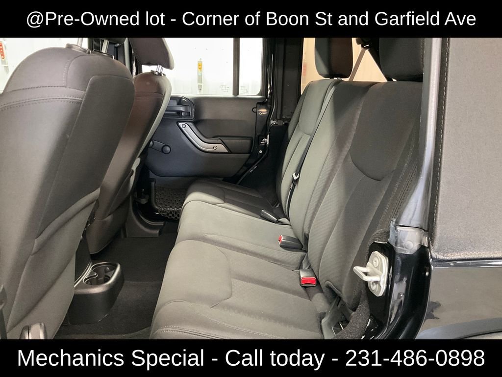 Used 2015 Black Jeep Unlimited Sport image 24