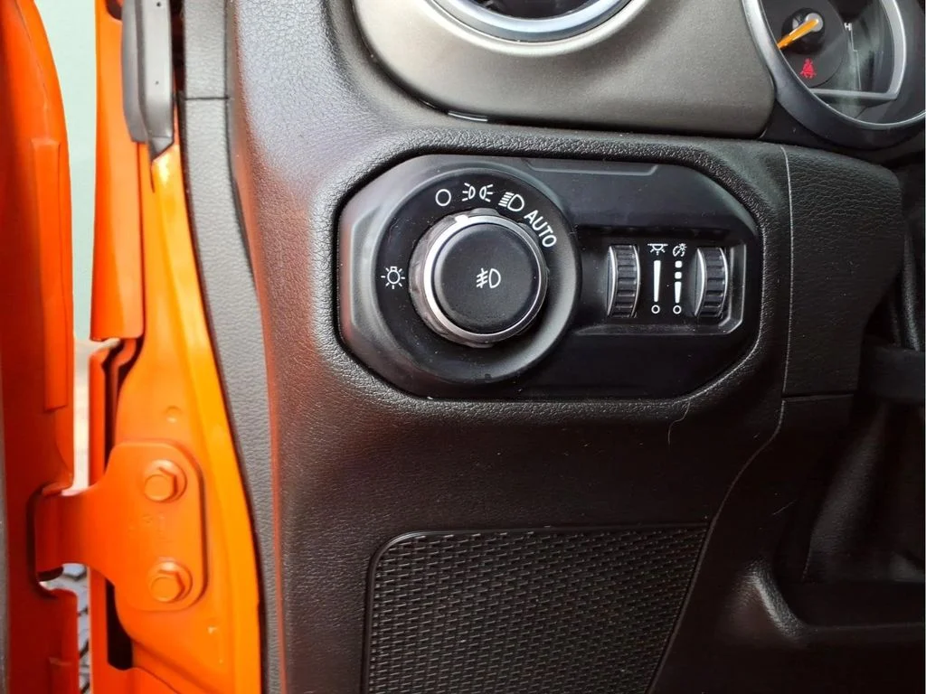 Used 2018 Orange Jeep Unlimited Sahara image 16