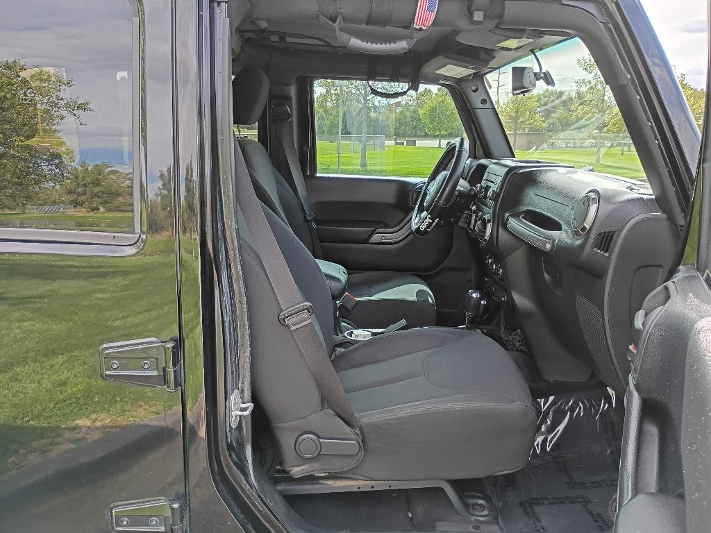 Used 2016 Black Clearcoat Jeep Sport image 11