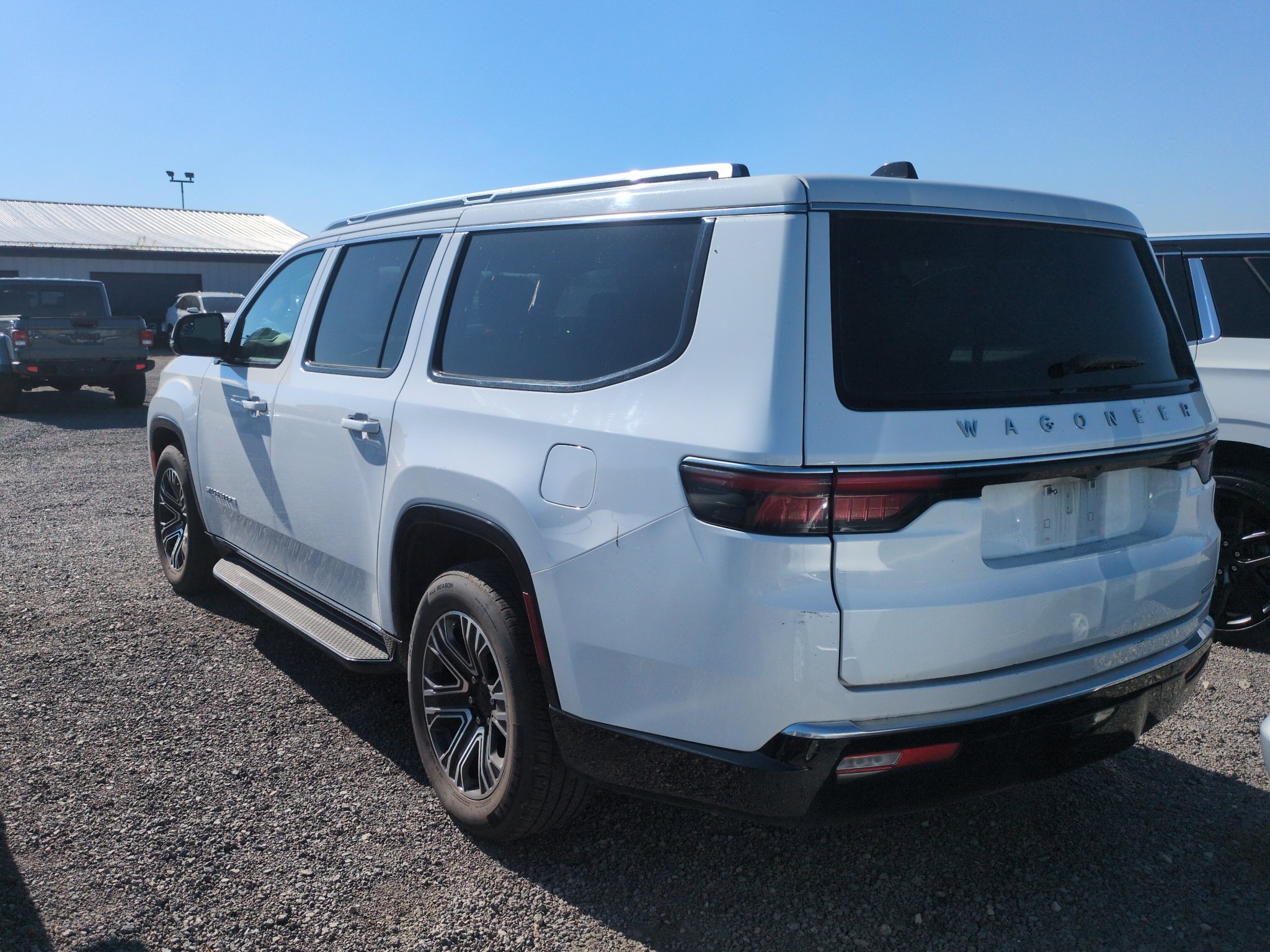 Used 2024 Bright White Clearcoat Jeep Series II image 5