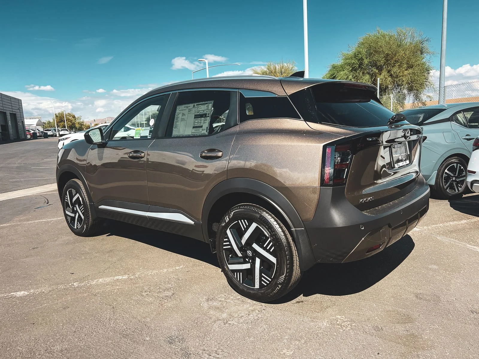 New 2026 Canyon Bronze Metallic Nissan SV image 7
