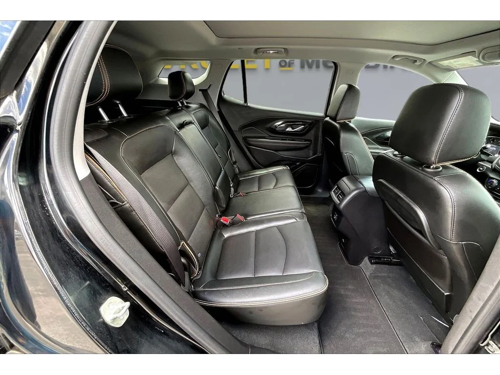 Used 2024 Ebony Twilight Metallic GMC AT4 image 19