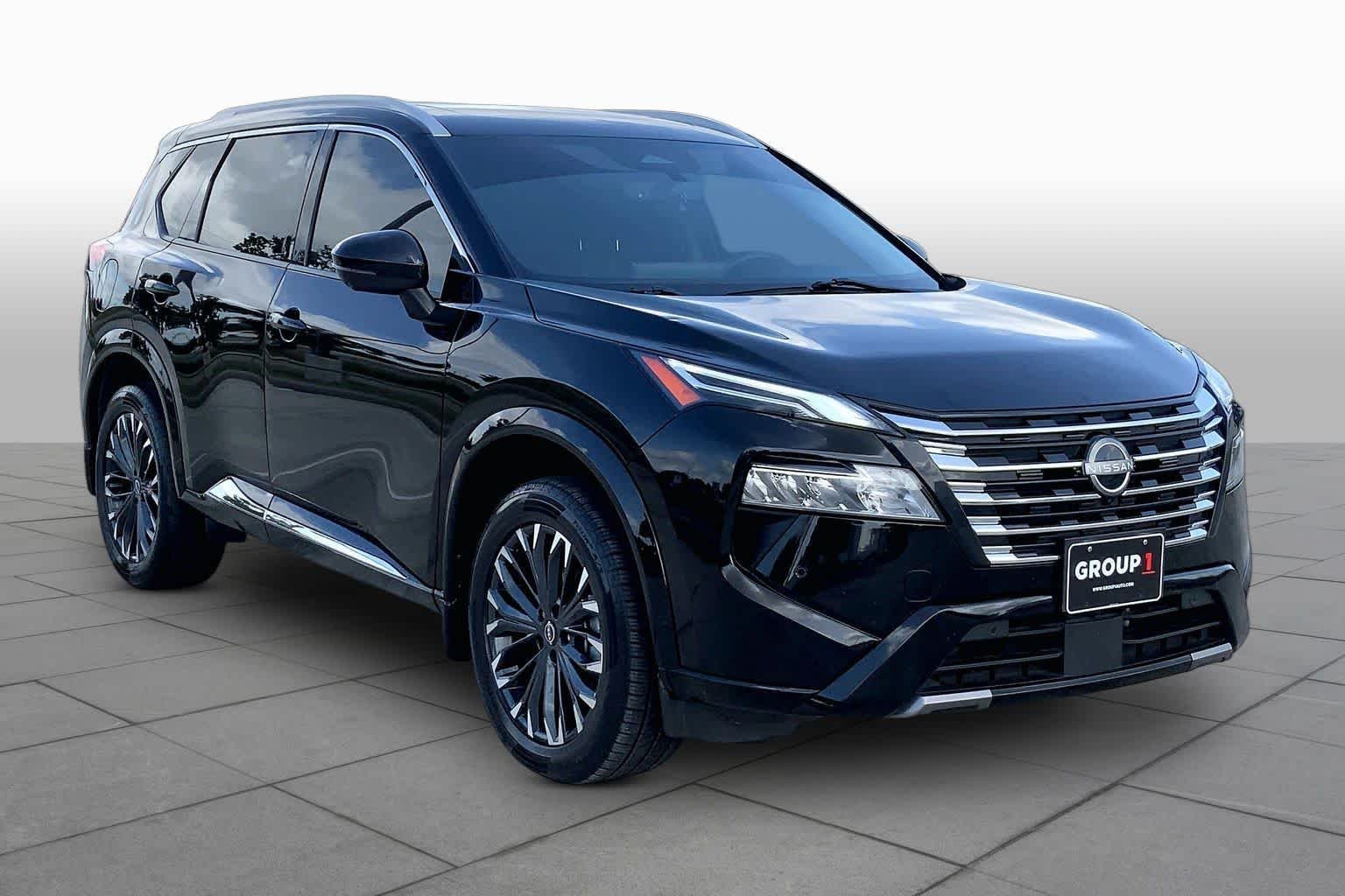 Used 2024 Super Black Nissan Platinum image 3