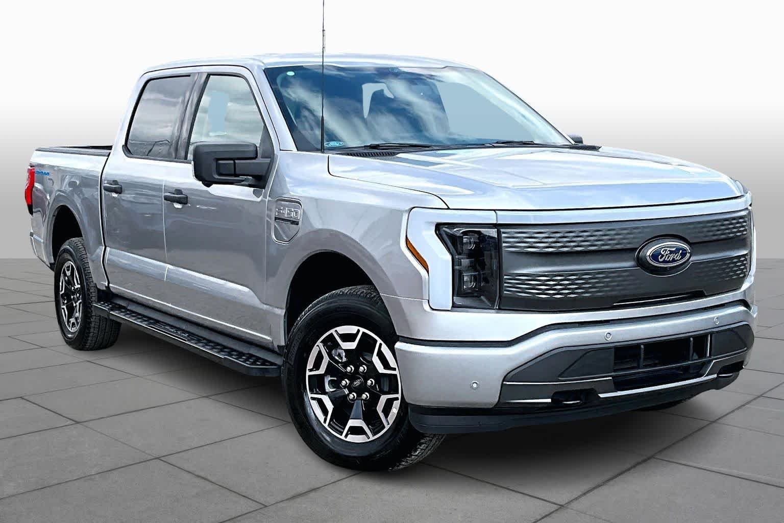 Certified 2022 Ford F-150 Lightning XLT with VIN 1FT6W1EV1NWG11503 for sale in Austin, TX