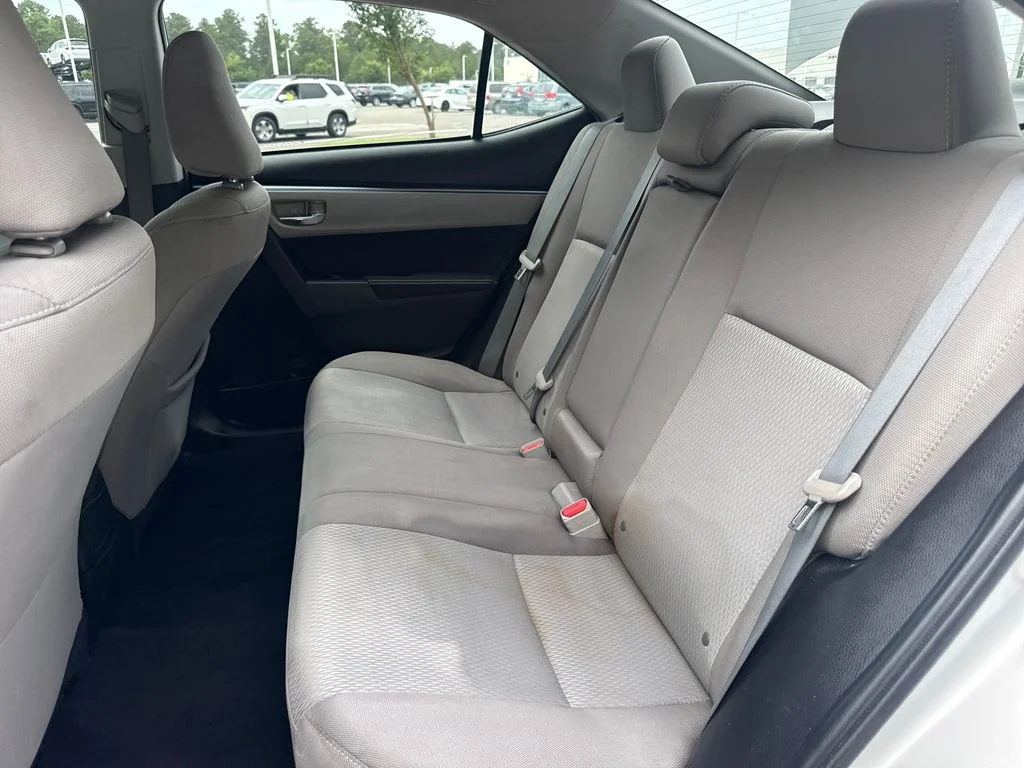 Used 2016 Classic Silver Metallic Toyota LE image 31