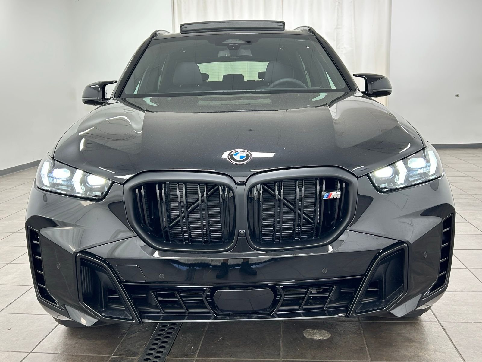 New 2026 Black Sapphire Metallic BMW M60i image 7