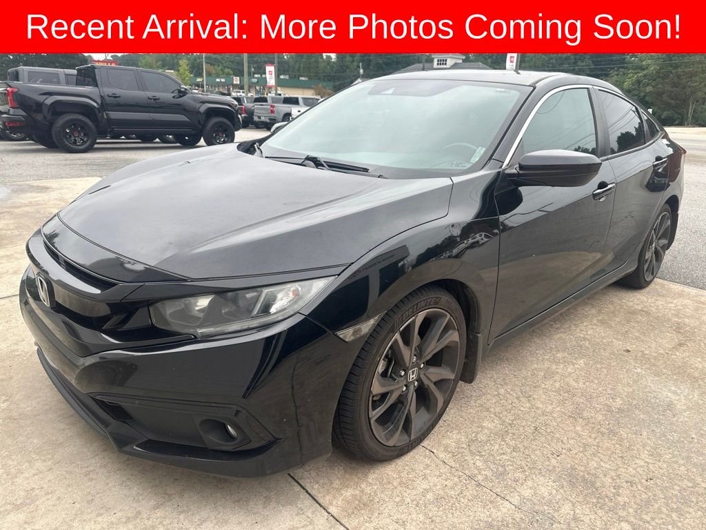 Used 2020 Crystal Black Honda Sport image 1