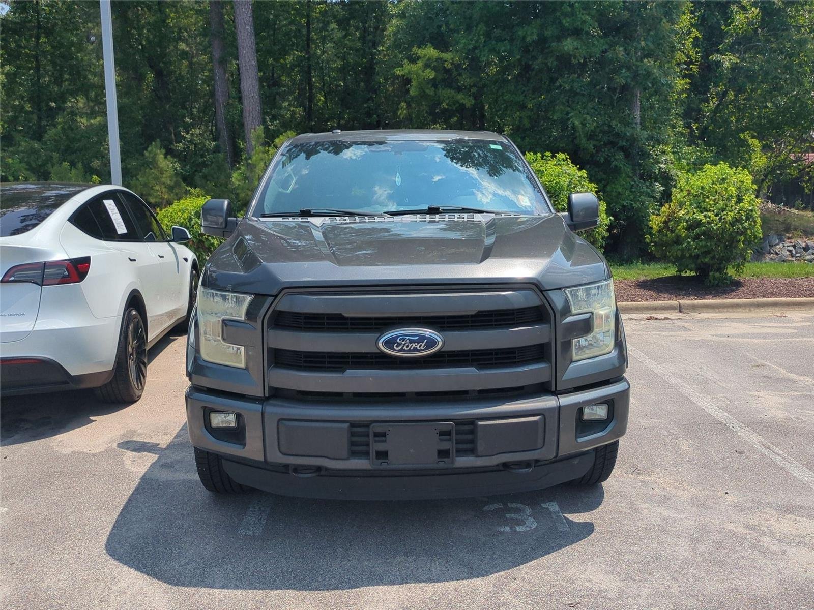 Used 2015 Magnetic Metallic Ford Lariat image 2