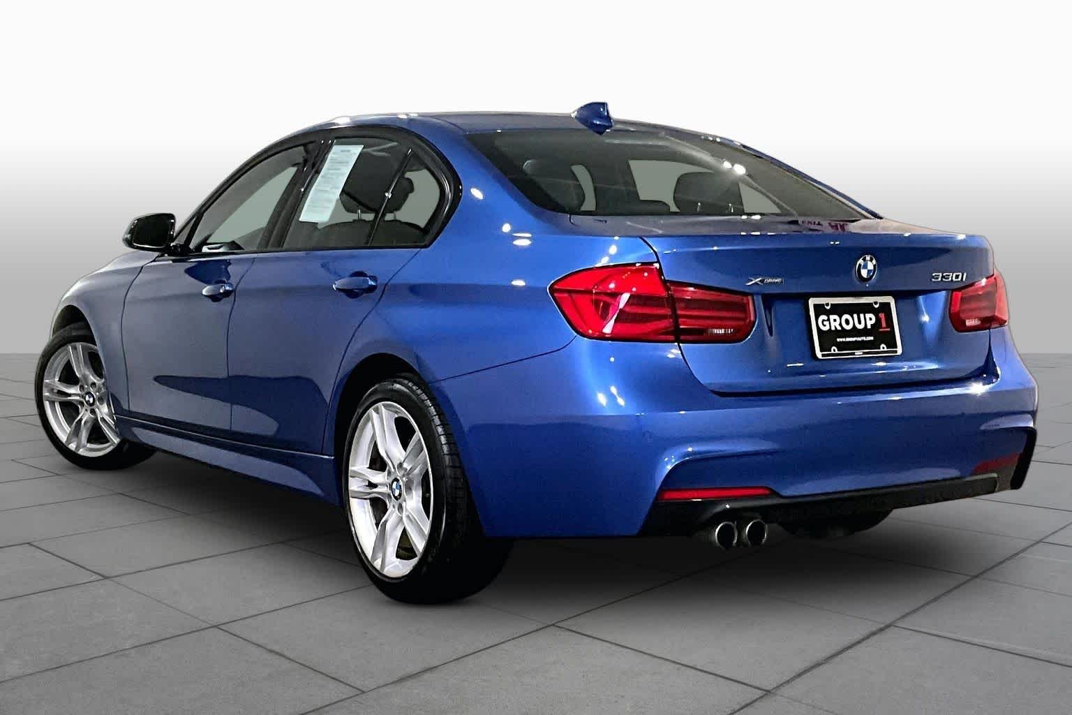 Used 2018 Estoril Blue Metallic BMW 330i xDrive image 11
