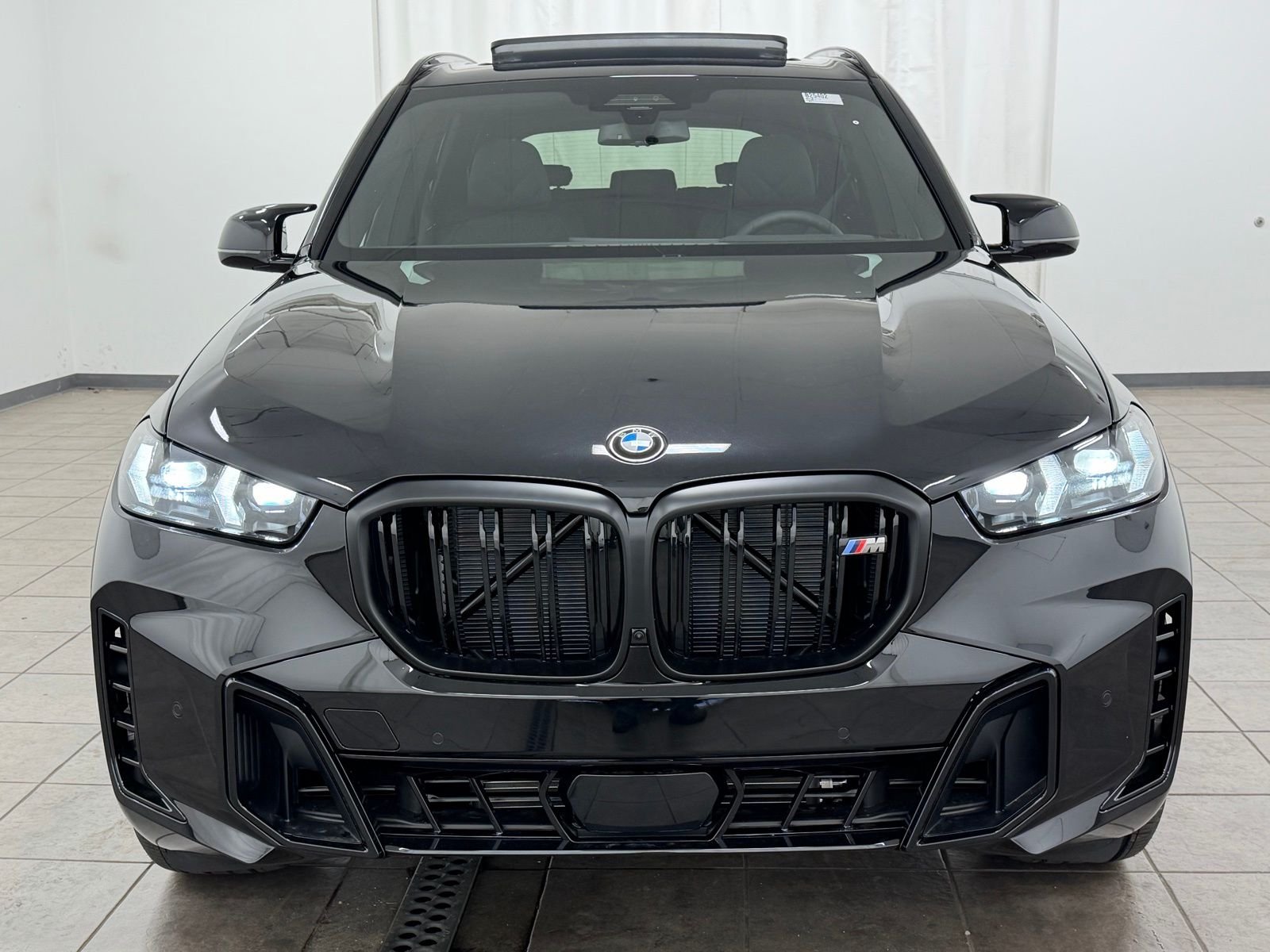 New 2026 Black Sapphire Metallic BMW M60i image 11