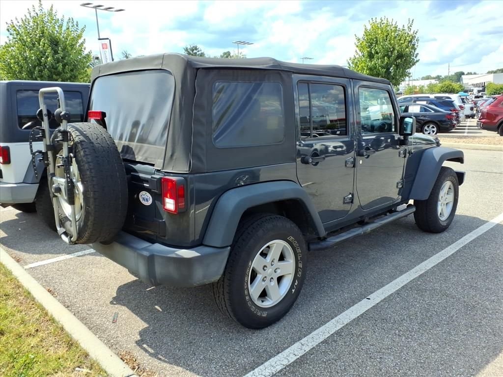 Used 2016 Black Jeep Unlimited Sport image 2