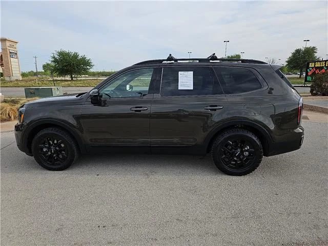Used 2024 Dark Moss KIA SX-Prestige X-Pro All-Wheel Drive image 2