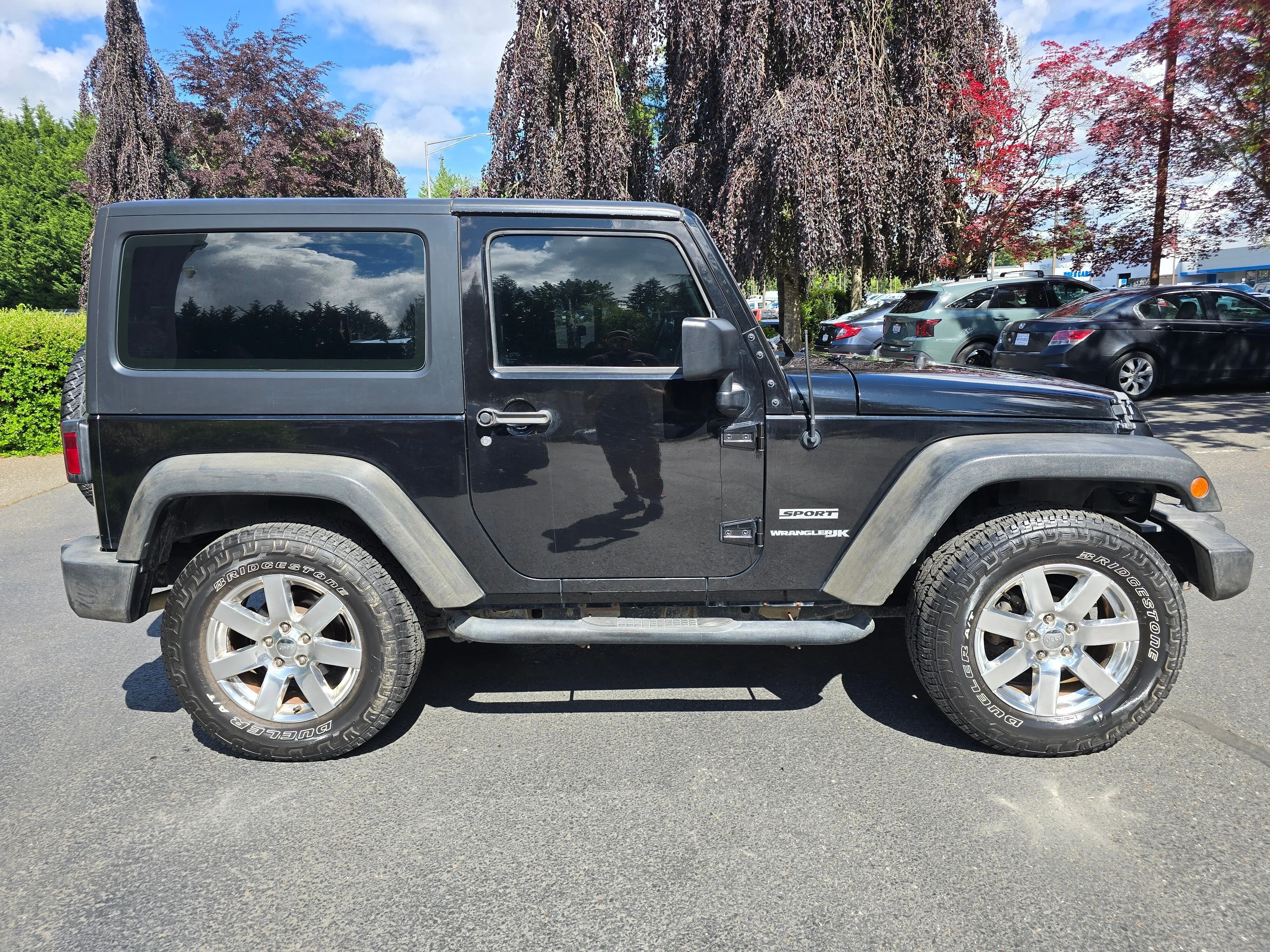 Used 2018 Black Clearcoat Jeep Sport image 3
