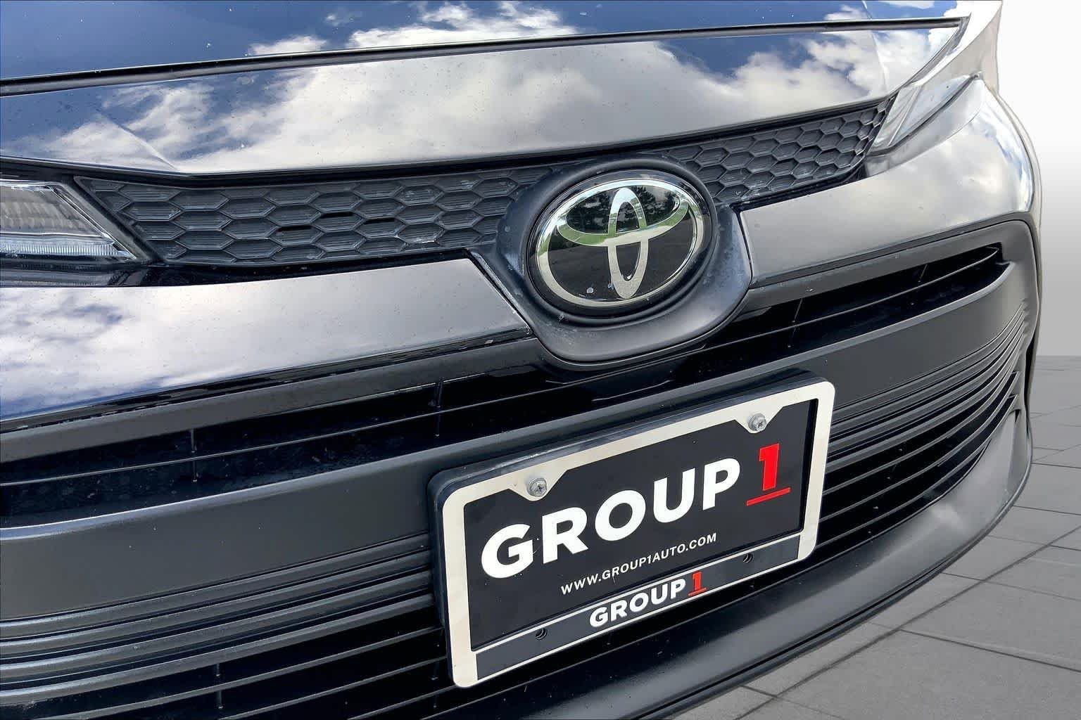 Used 2023 Midnight Black Metallic Toyota LE image 29