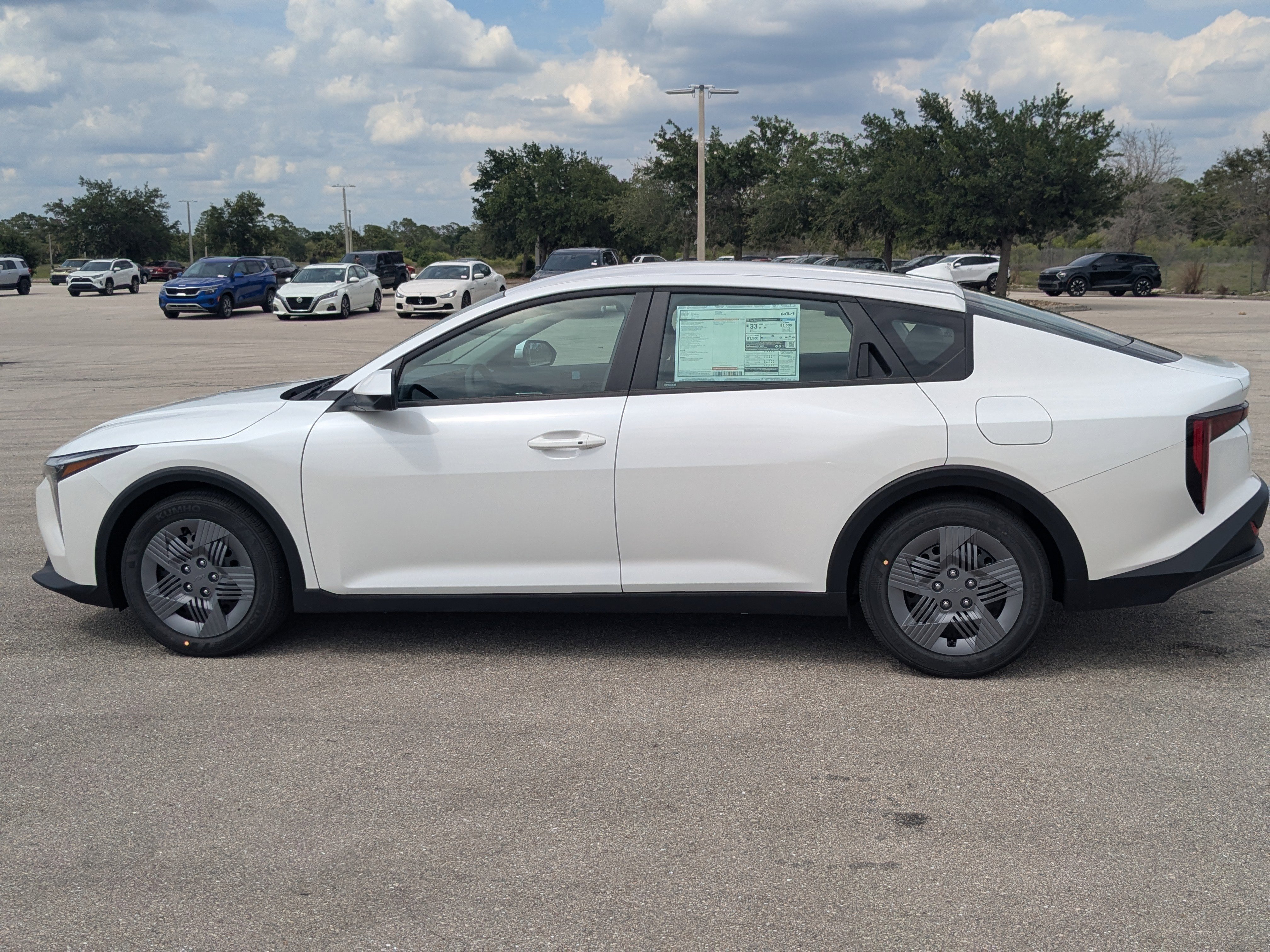 New 2026 Snow White Pearl Kia LX image 8