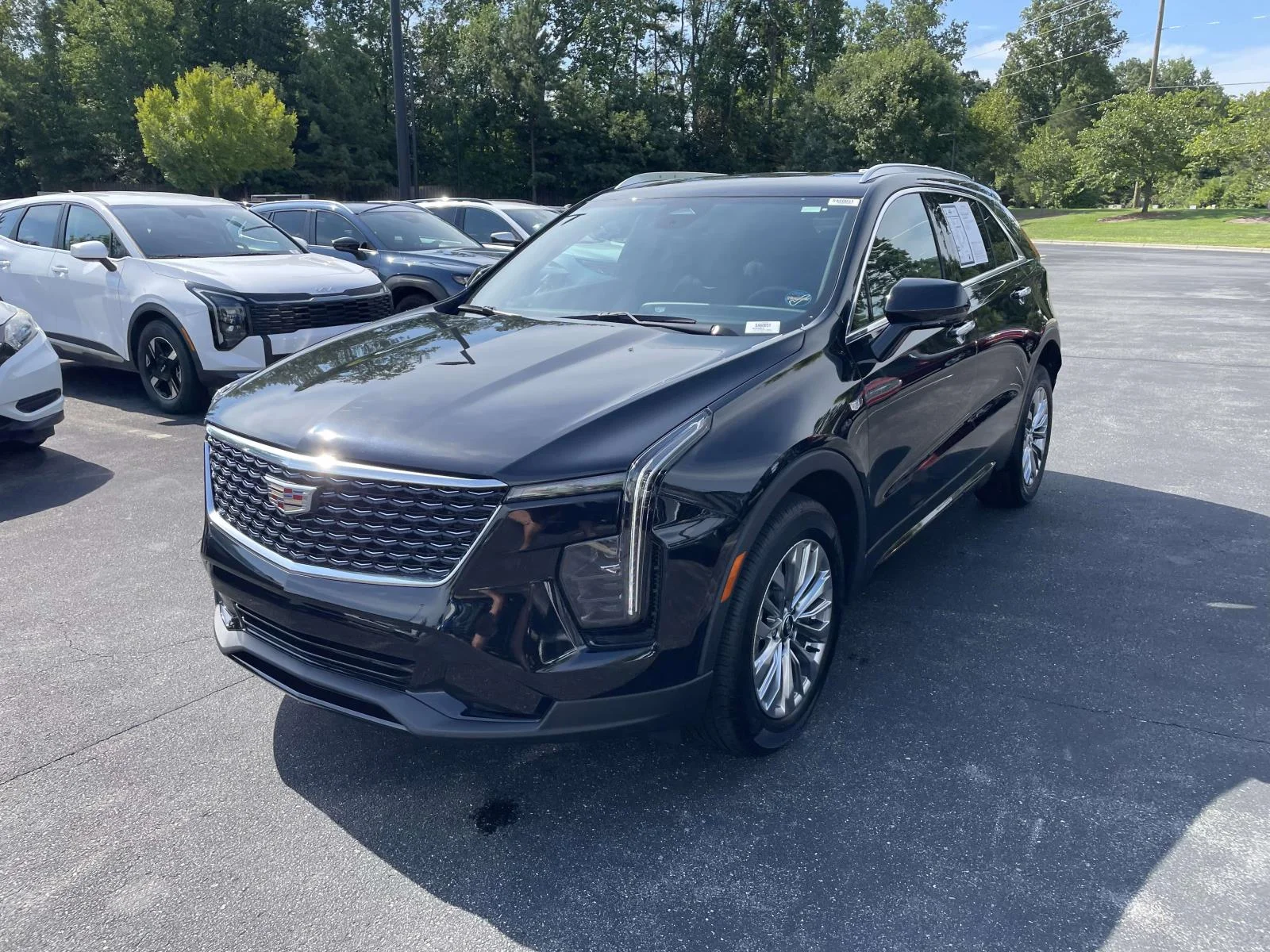 Used 2025 Stellar Black Metallic Cadillac Premium Luxury image 3