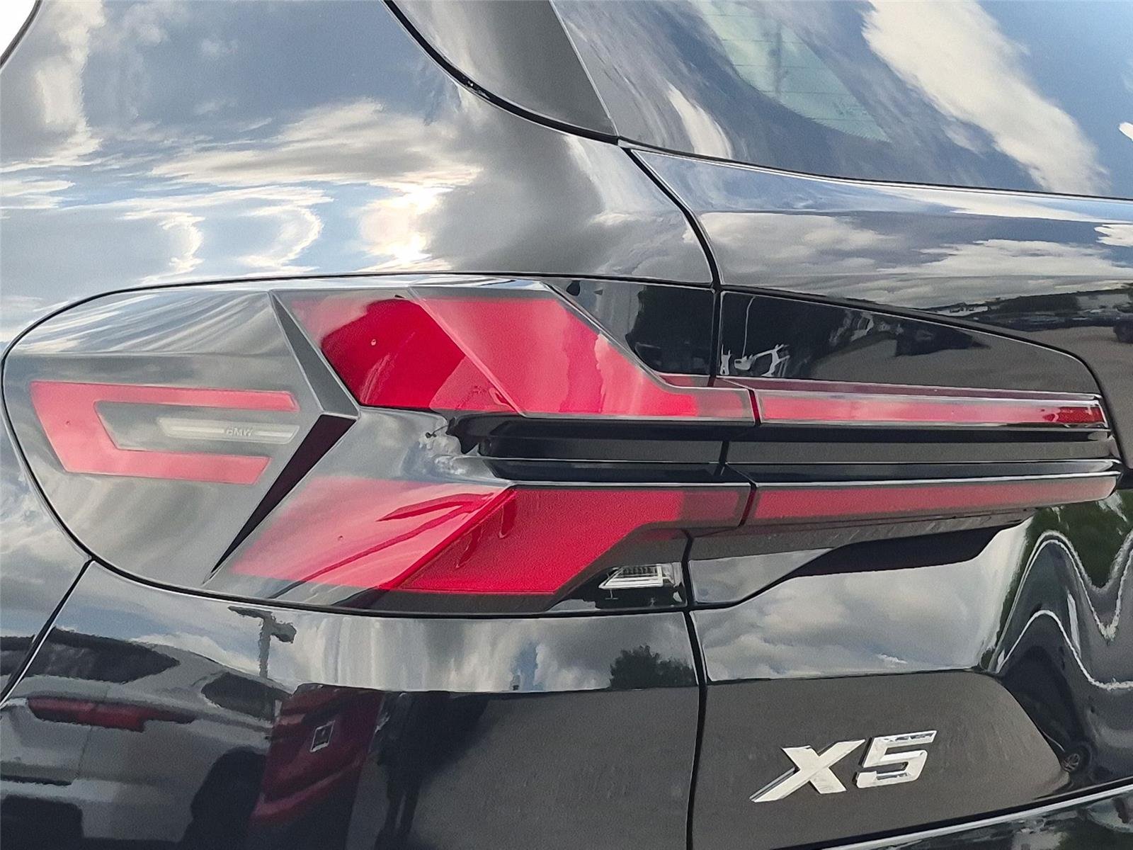 New 2026 Black Sapphire Metallic BMW xDrive50e image 12