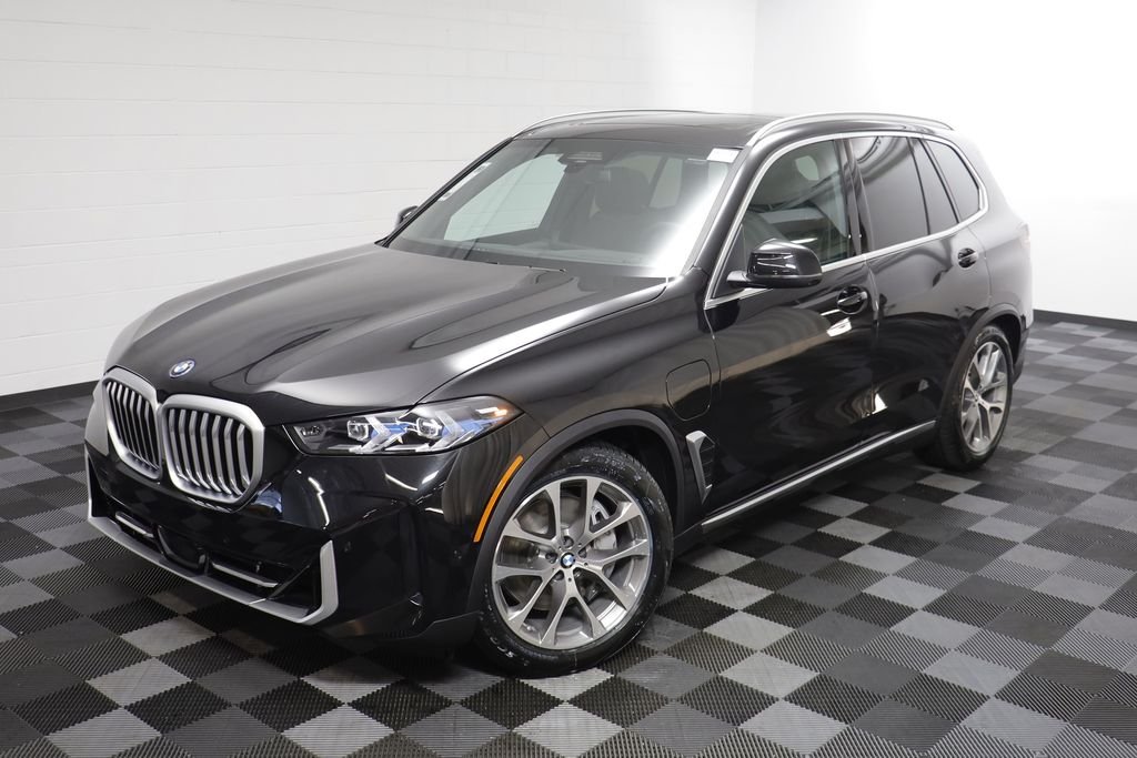 New 2026 Black Sapphire Metallic BMW xDrive50e image 2