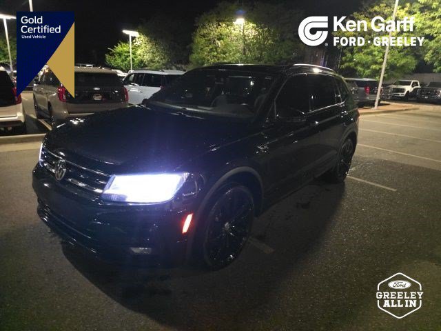 Used 2021 Deep Black Pearl Effect Volkswagen SE image 1