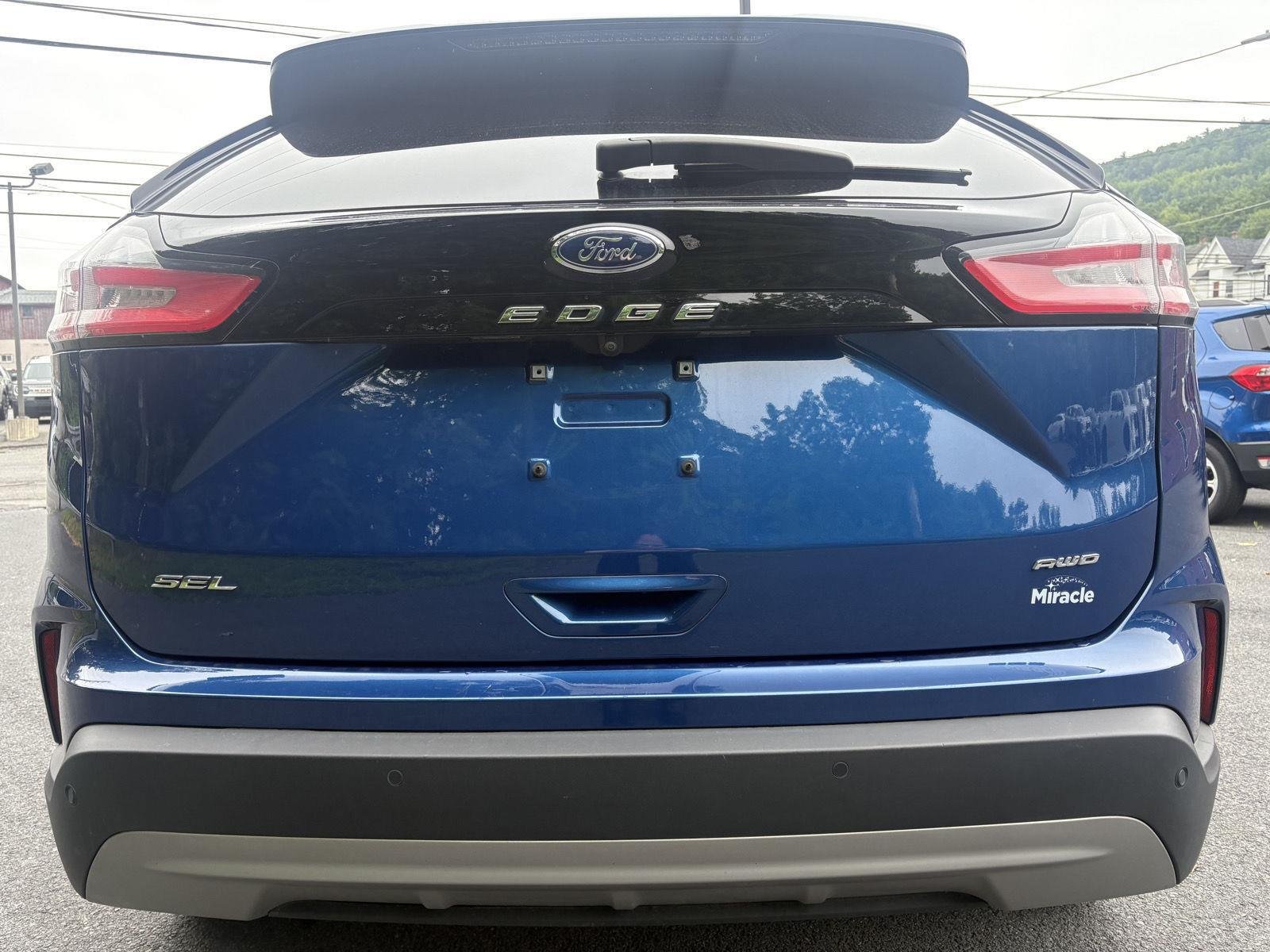 Used 2023 Atlas Blue Metallic FORD TRUCK SEL image 4