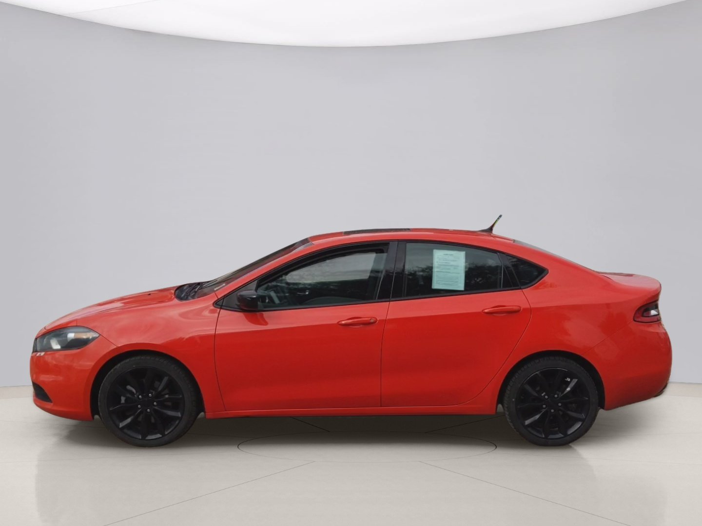 Used 2016 Orange Dodge SXT image 2