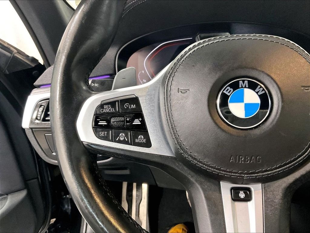 Used 2022 Black BMW M550i xDrive image 23