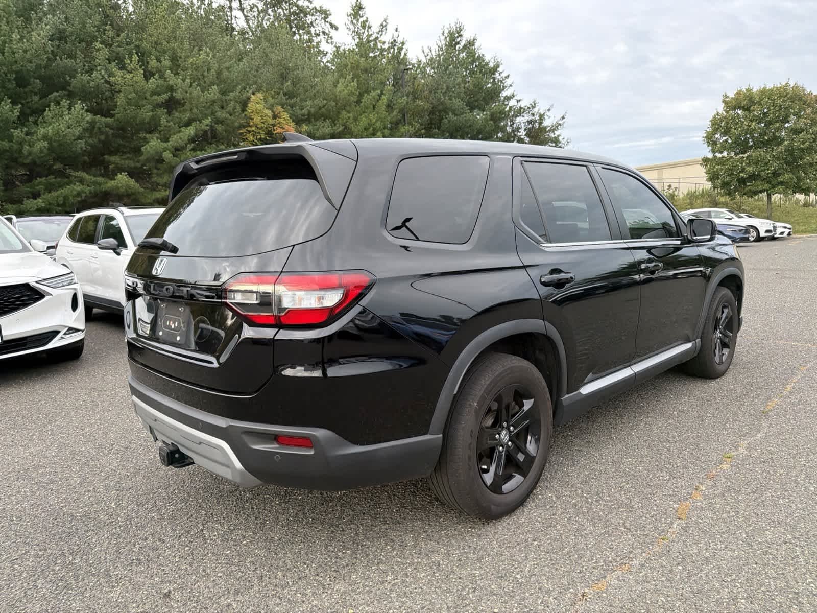 Used 2023 Crystal Black Pearl Honda EX-L 7 Passenger image 5