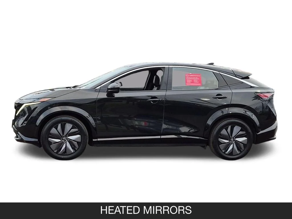 Used 2024 Black Nissan EVOLVE+ image 5
