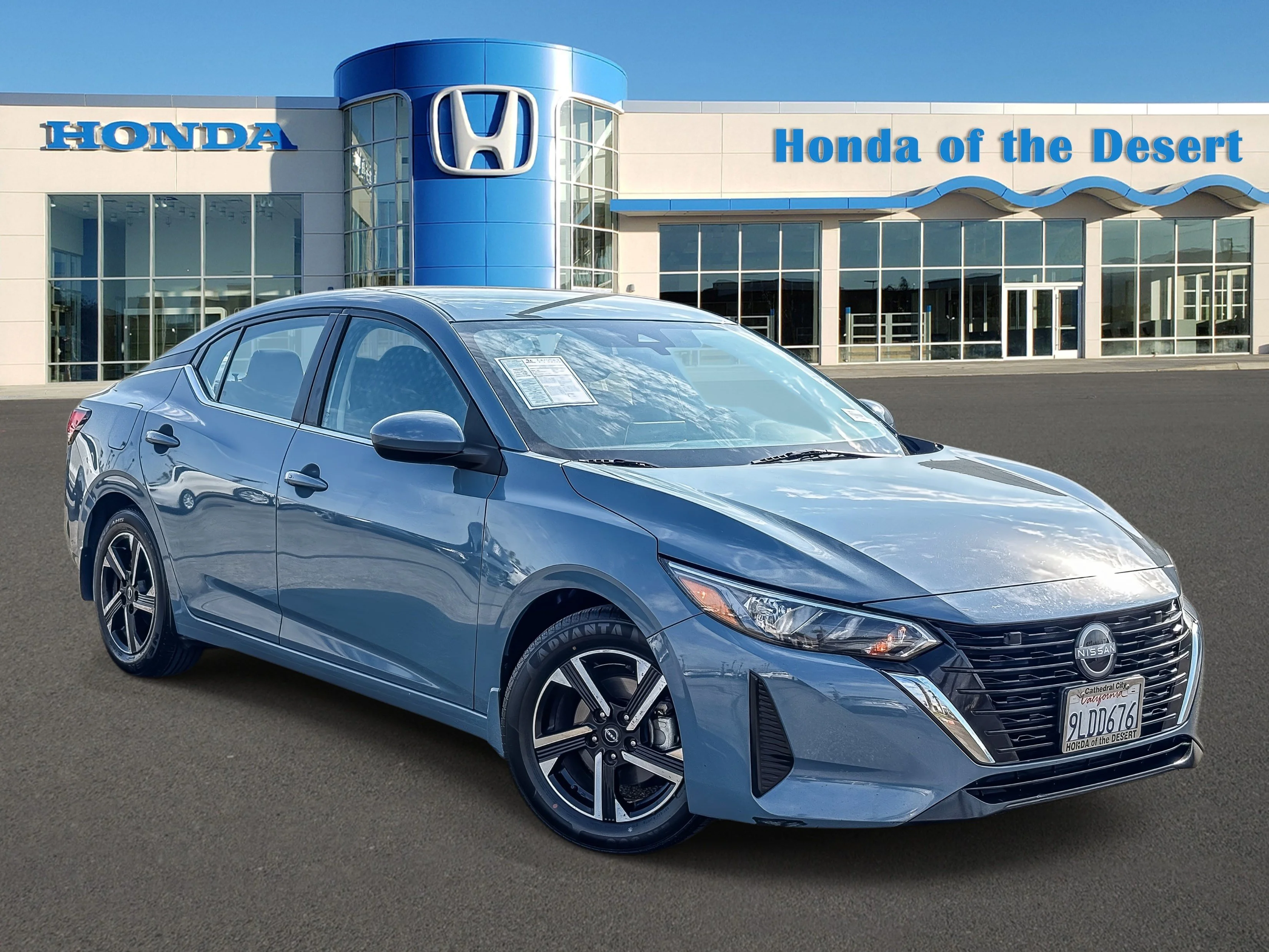 Used 2024 Atlantic Gray Metallic Nissan SV image 1