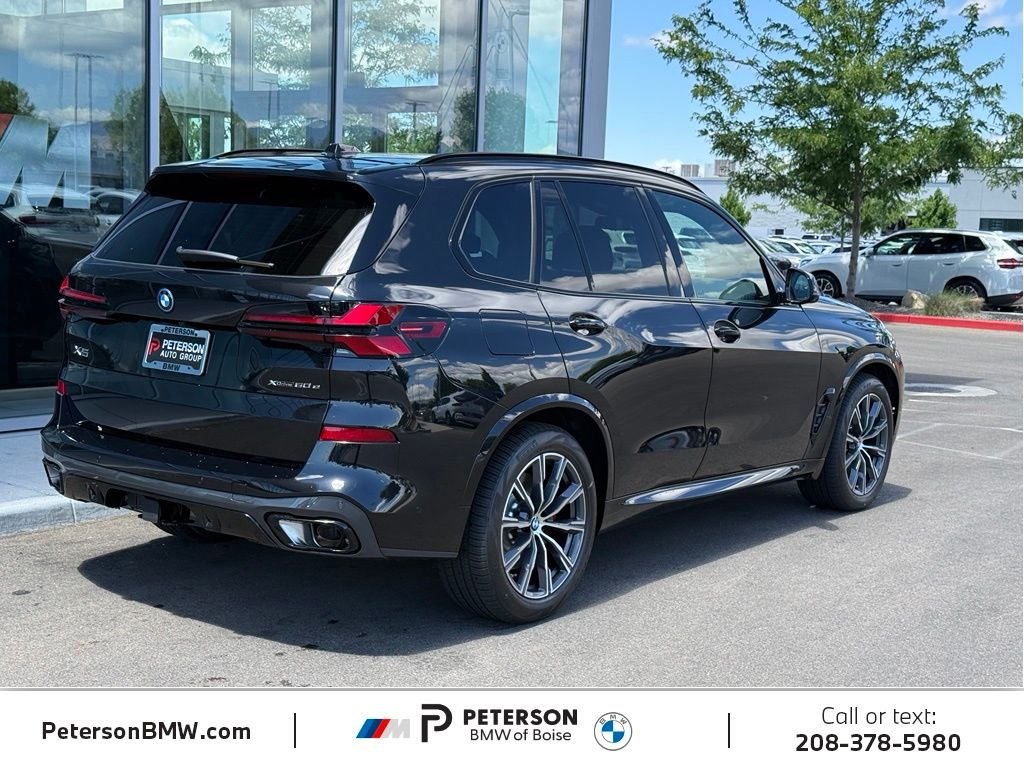 New 2026 Black Sapphire Metallic BMW xDrive50e image 5