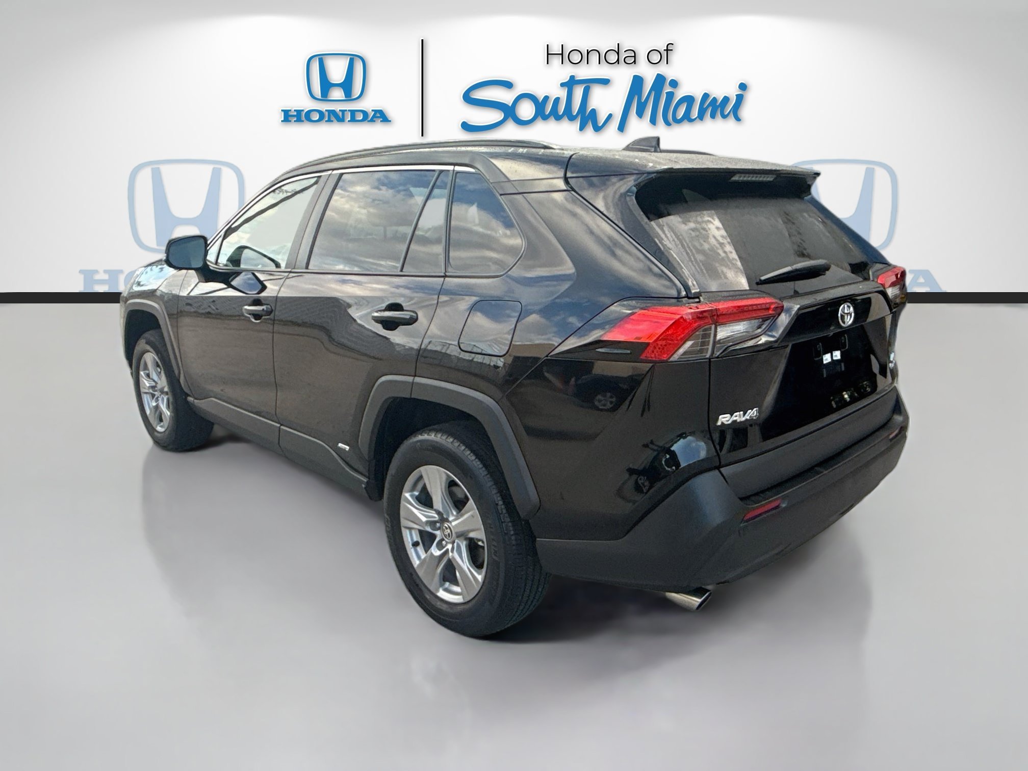 Used 2025 Midnight Black Metallic Toyota Hybrid LE image 5