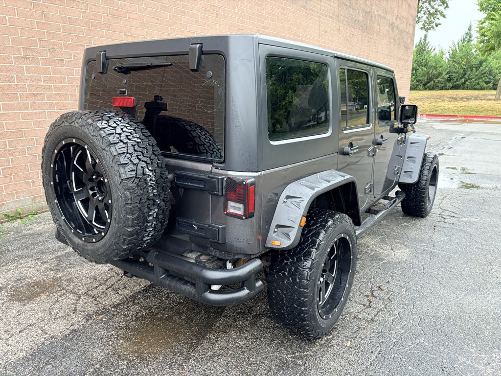 Used 2017 Granite Crystal Metallic Clearcoat Jeep Sport image 5