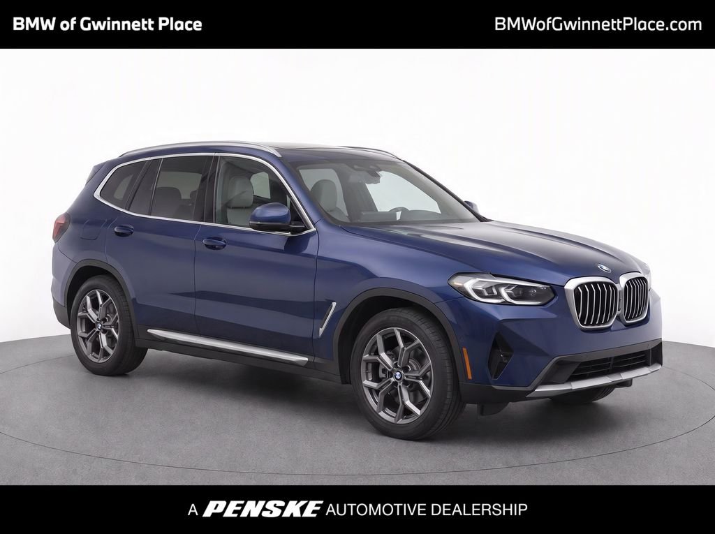 Certified Used 2024 Blue Metallic BMW sDrive30i image 1