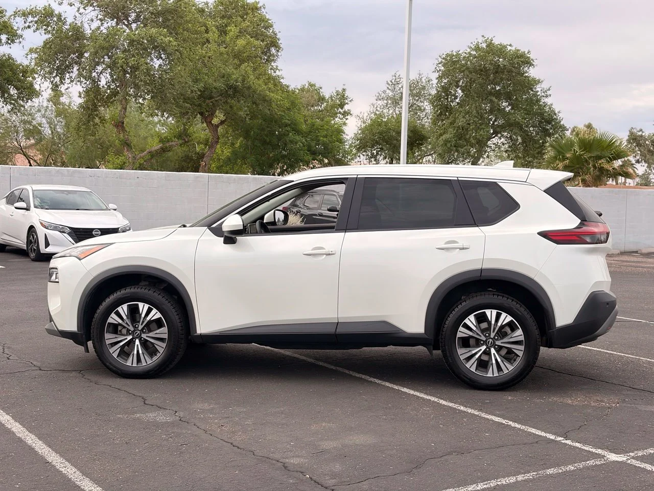 Used 2023 Pearl White Tricoat Nissan SV image 2