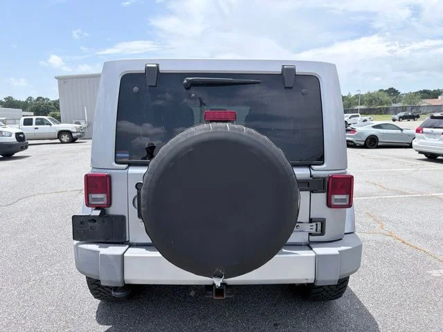 Used 2016 Silver Jeep Unlimited Sahara image 4